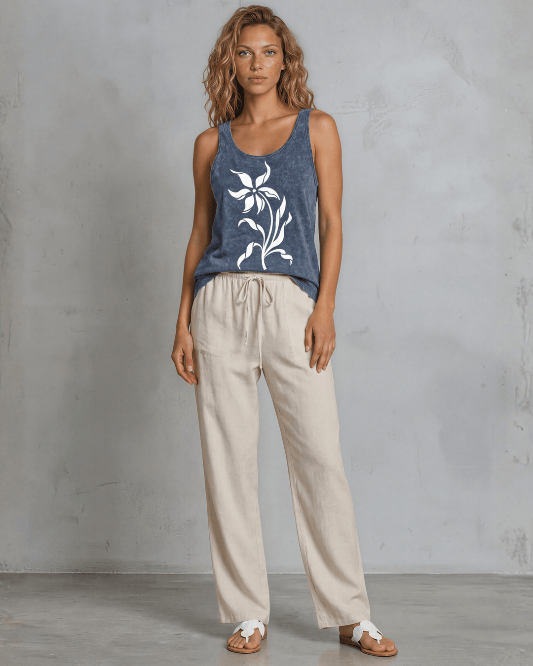 Lily Whisper botanical floral graphic tank in mineral-washed denim blue. Made in USA with USA-grown cotton, soft 95% cotton/5% spandex, relaxed fit.
