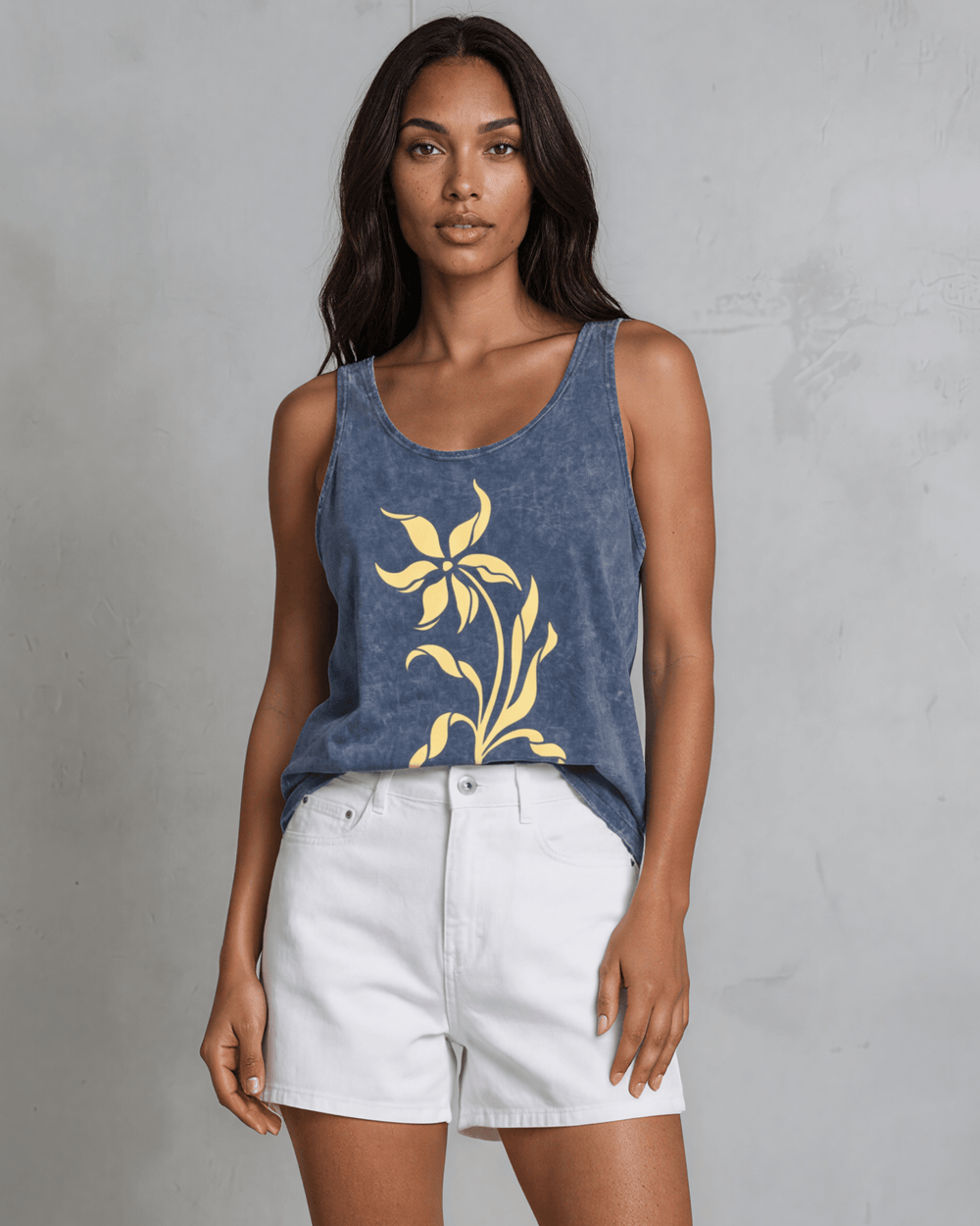 Lily Whisper botanical floral graphic tank in mineral-washed denim blue. Made in USA with USA-grown cotton, soft 95% cotton/5% spandex, relaxed fit.