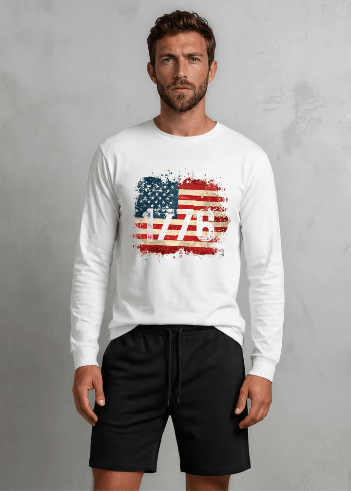 1776 Distressed American Flag Long Sleeve Tee — Made in USA with USA Cotton. Bold vintage flag graphic on white, 100% pre-shrunk cotton. Perfect for 4th of July.