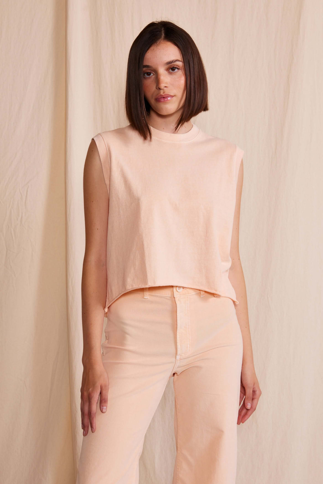 Ana Tank by People of Leisure — 100% organic cotton, relaxed fit, sleeveless in 6 colors. Ethically made in LA. Sizes XS–XL.