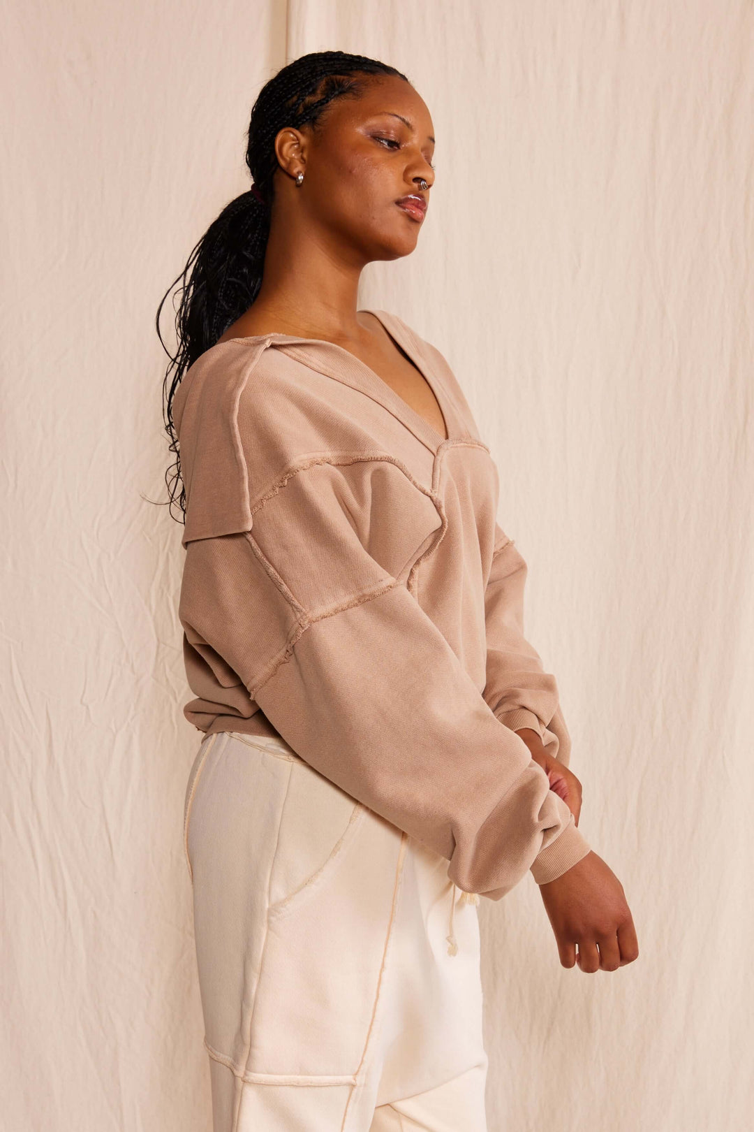  Ryanne Sweatshirt by People of Leisure — 100% organic cotton, deep V-neck, raw edges in Camel &amp; Vintage Black. Made in LA. Sizes XS–XL