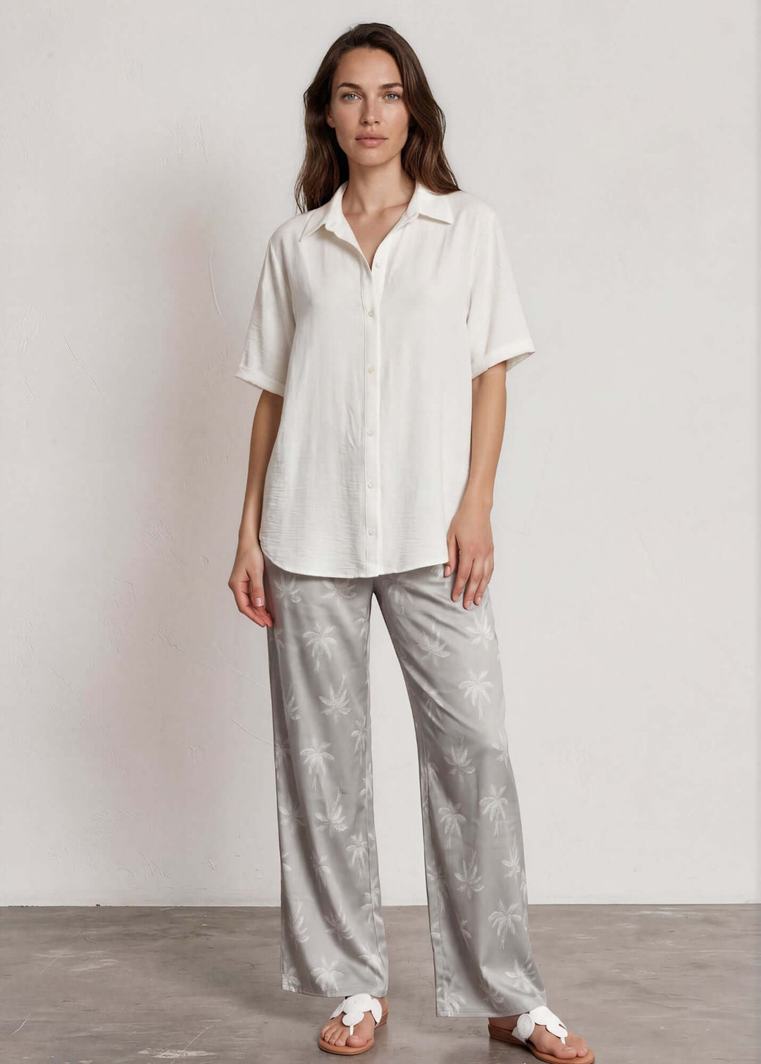  Presley Palm Tree Wide Leg Pants — a relaxed wide-leg style with a tonal palm print, elastic waist &amp; drawstring. Made in USA. Perfect for resort &amp; vacation.