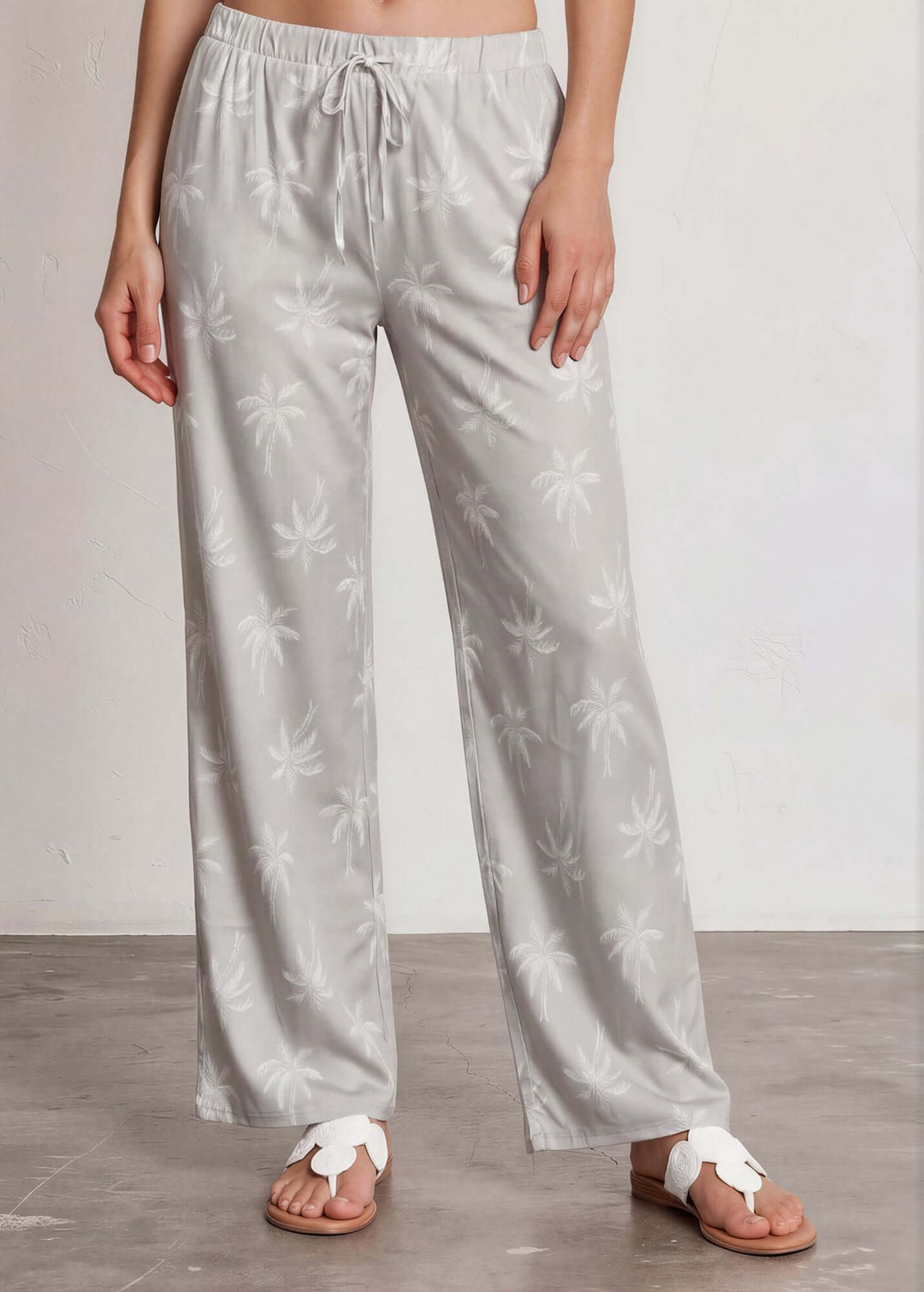  Presley Palm Tree Wide Leg Pants — a relaxed wide-leg style with a tonal palm print, elastic waist & drawstring. Made in USA. Perfect for resort & vacation.
