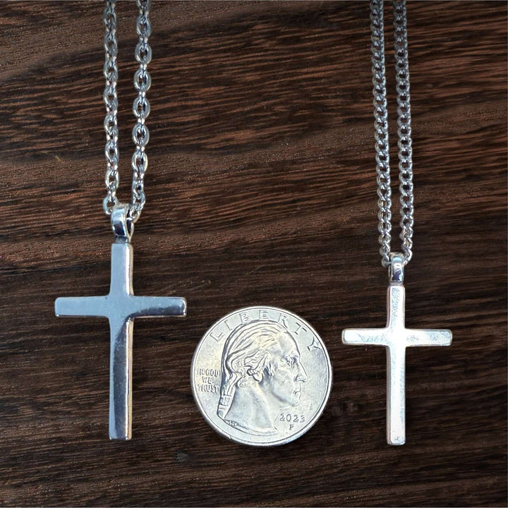 Handcrafted solid sterling silver cross necklace on a stainless steel chain. Custom lengths available. Made in USA with a lifetime warranty. 