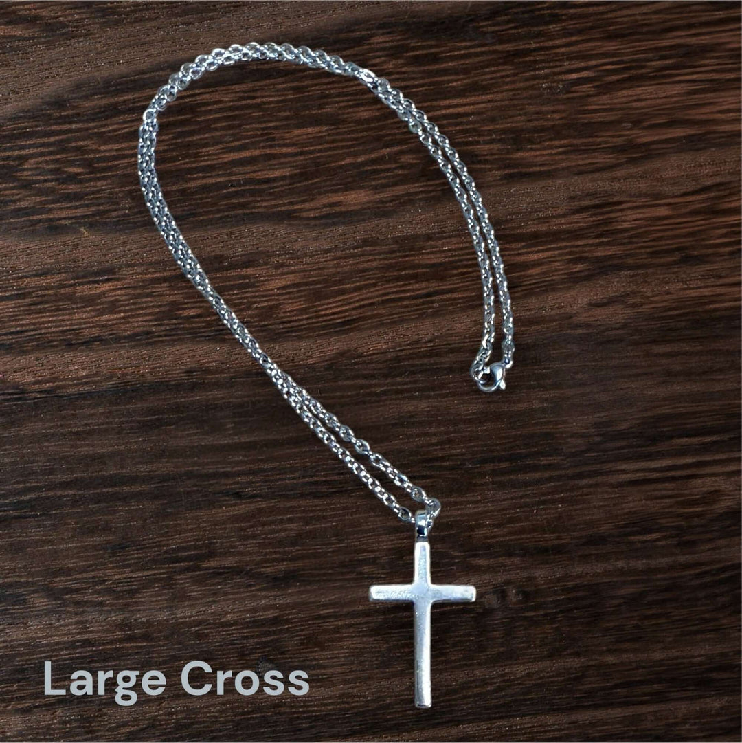 Handcrafted solid sterling silver cross necklace on a stainless steel chain. Custom lengths available. Made in USA with a lifetime warranty. 