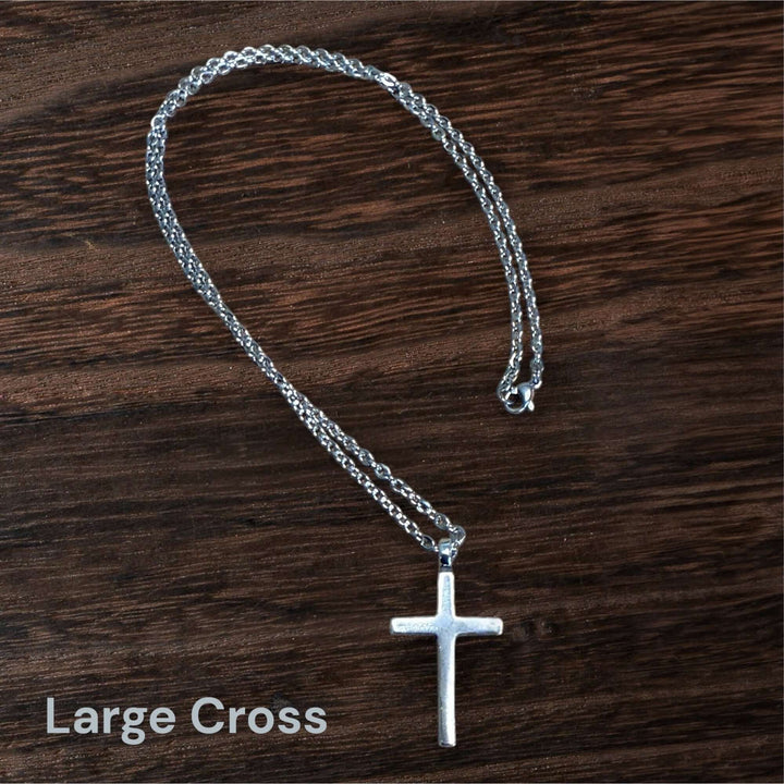 Handcrafted solid sterling silver cross necklace on a stainless steel chain. Custom lengths available. Made in USA with a lifetime warranty. 