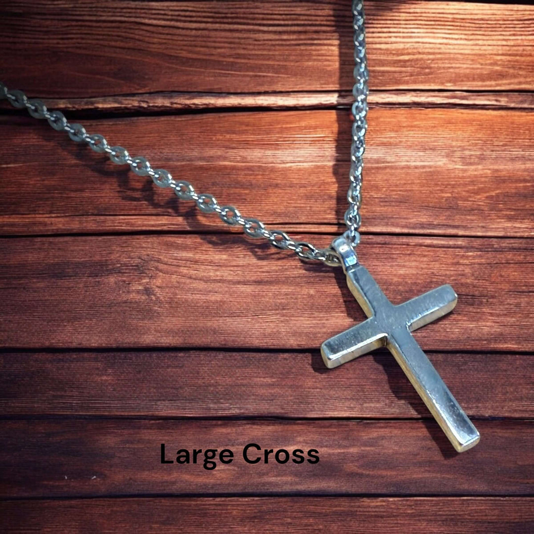 Handcrafted solid sterling silver cross necklace on a stainless steel chain. Custom lengths available. Made in USA with a lifetime warranty. 