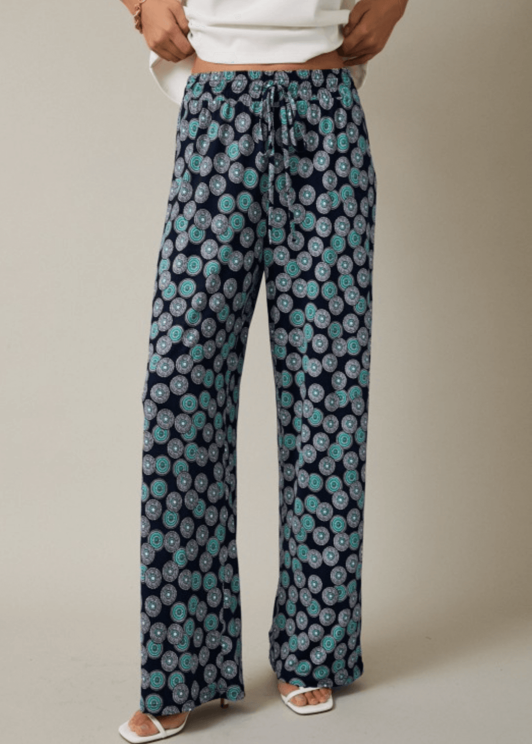 Shop the Sand Dollar Seas Drawstring Pants — lightweight jersey stretch, relaxed fit, side pockets & drawstring waist. Casual comfort, Made in USA.
