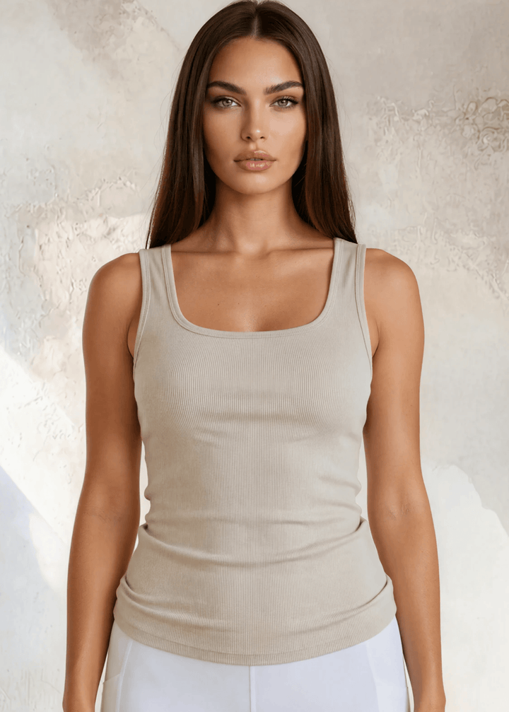 The Scoop is an extra-long extra supportive scoop neck compression tank top that comfortably helps smooth out those unwanted lumps and bumps. Made in USA