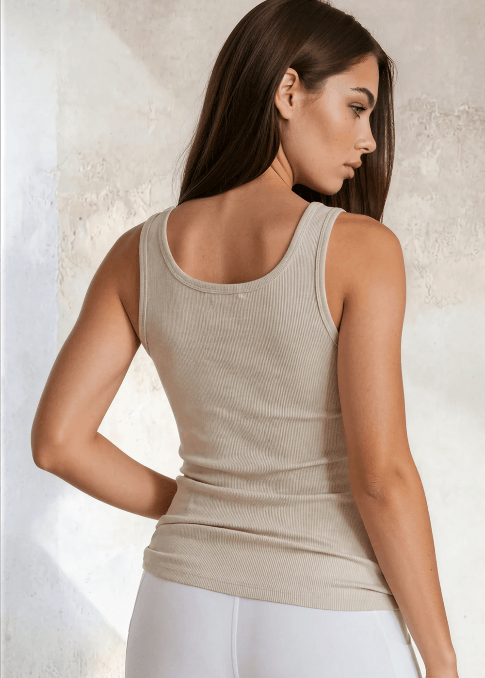 The Scoop is an extra-long extra supportive scoop neck compression tank top that comfortably helps smooth out those unwanted lumps and bumps. Made in USA
