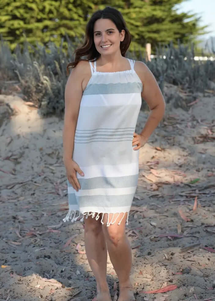 Shop the Beachables Skipper Cover Up Dress — handcrafted in the USA from soft Turkish Cotton. Adjustable drawstring, tassel hem, vibrant stripes. Perfect for beach