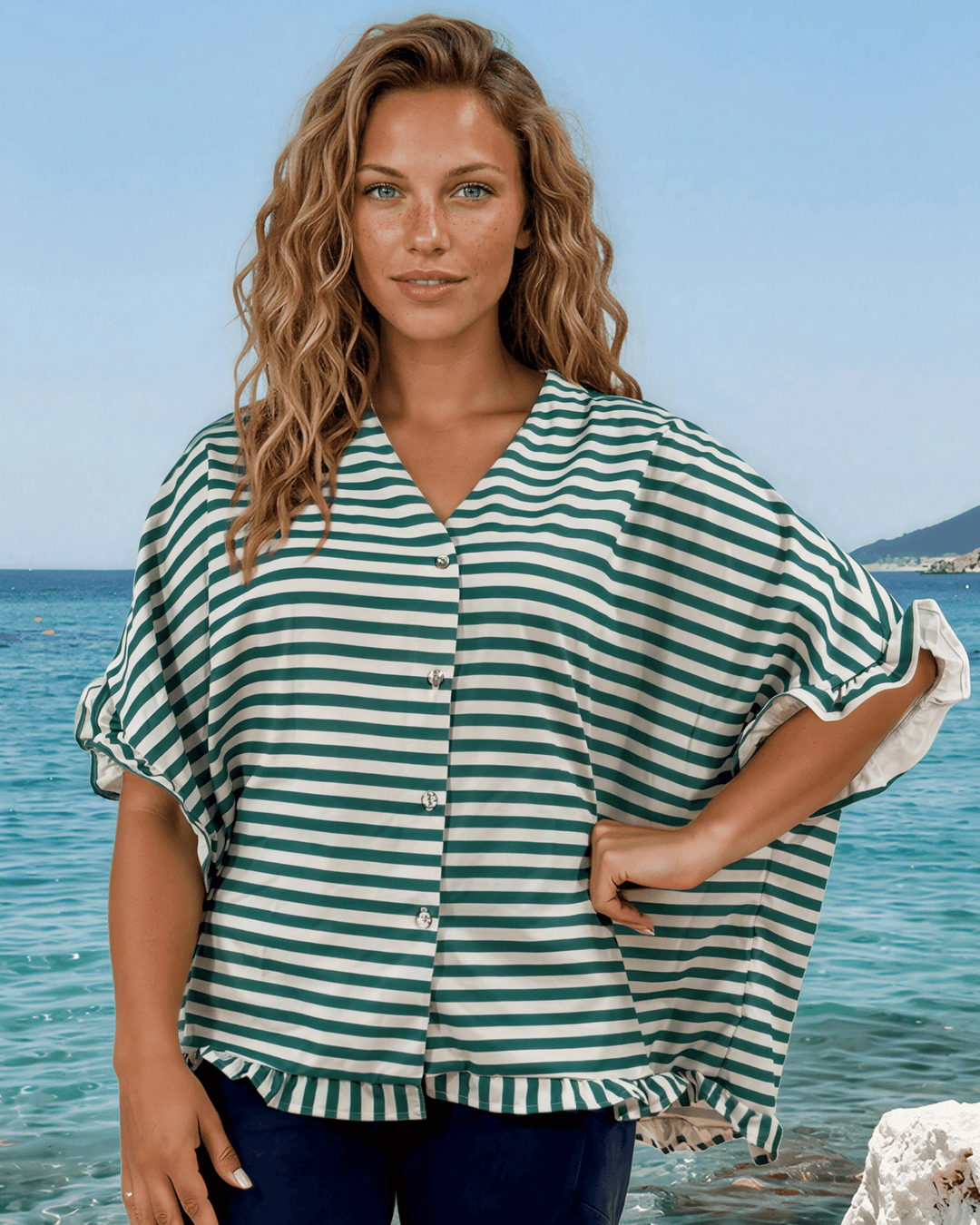 Effortlessly chic green &amp; white striped oversized top with ruffle cuffs &amp; button-up front. Lightweight, flowy fit perfect for spring &amp; summer. Made in USA.