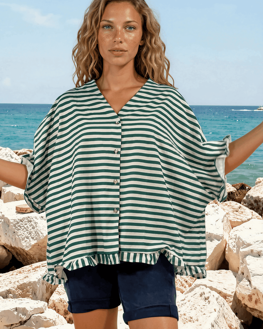 Effortlessly chic green & white striped oversized top with ruffle cuffs & button-up front. Lightweight, flowy fit perfect for spring & summer. Made in USA.