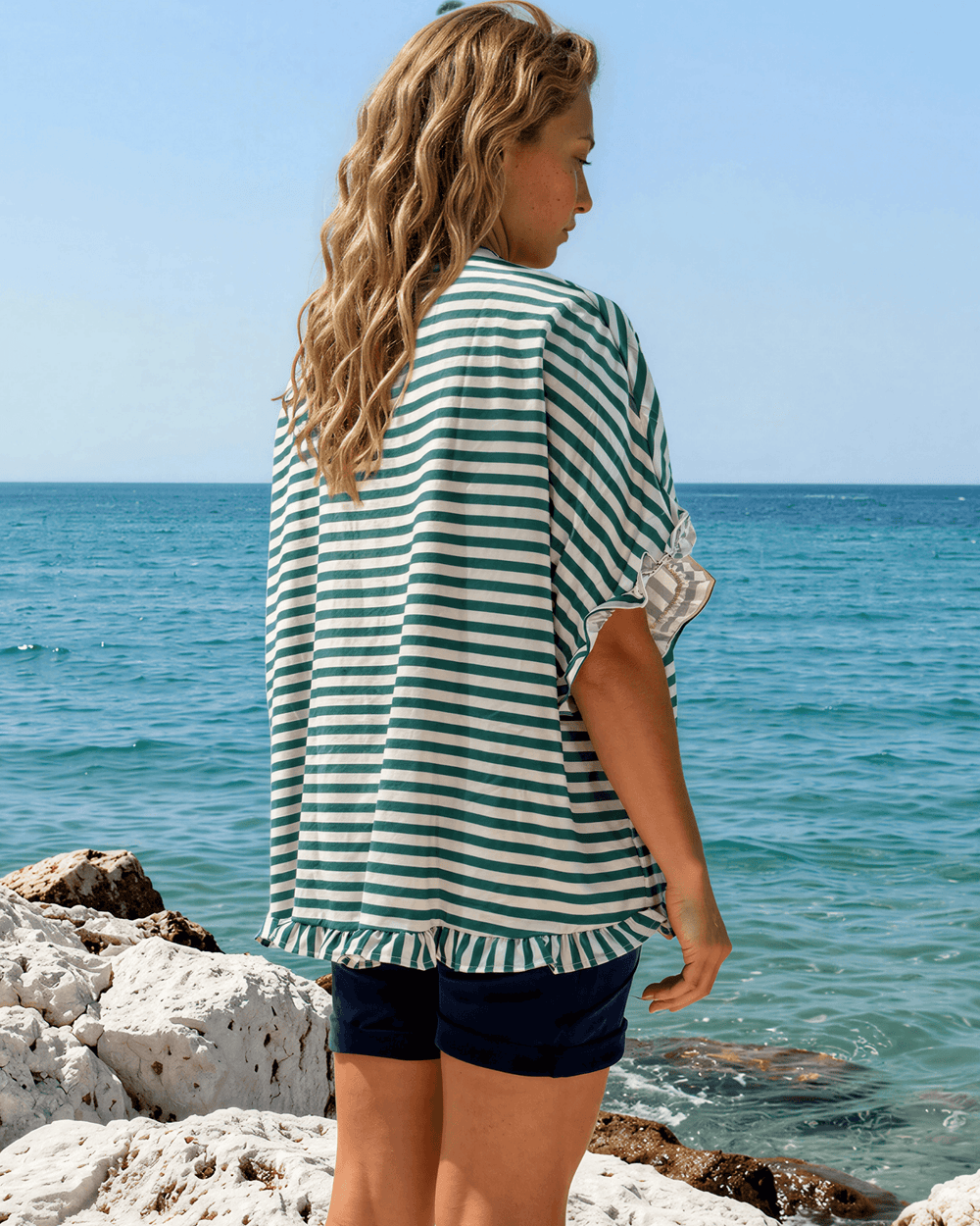 Effortlessly chic green & white striped oversized top with ruffle cuffs & button-up front. Lightweight, flowy fit perfect for spring & summer. Made in USA.