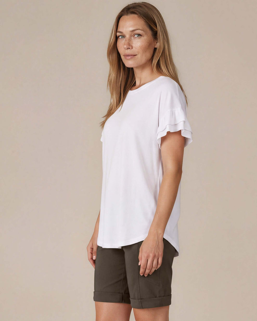 Shop the Ruffle Sleeve T-Shirt in white. Oversized fit, double flutter sleeves, crew neck. 95% Cotton, 5% Spandex. S–L. Made in USA. Free shipping may apply.