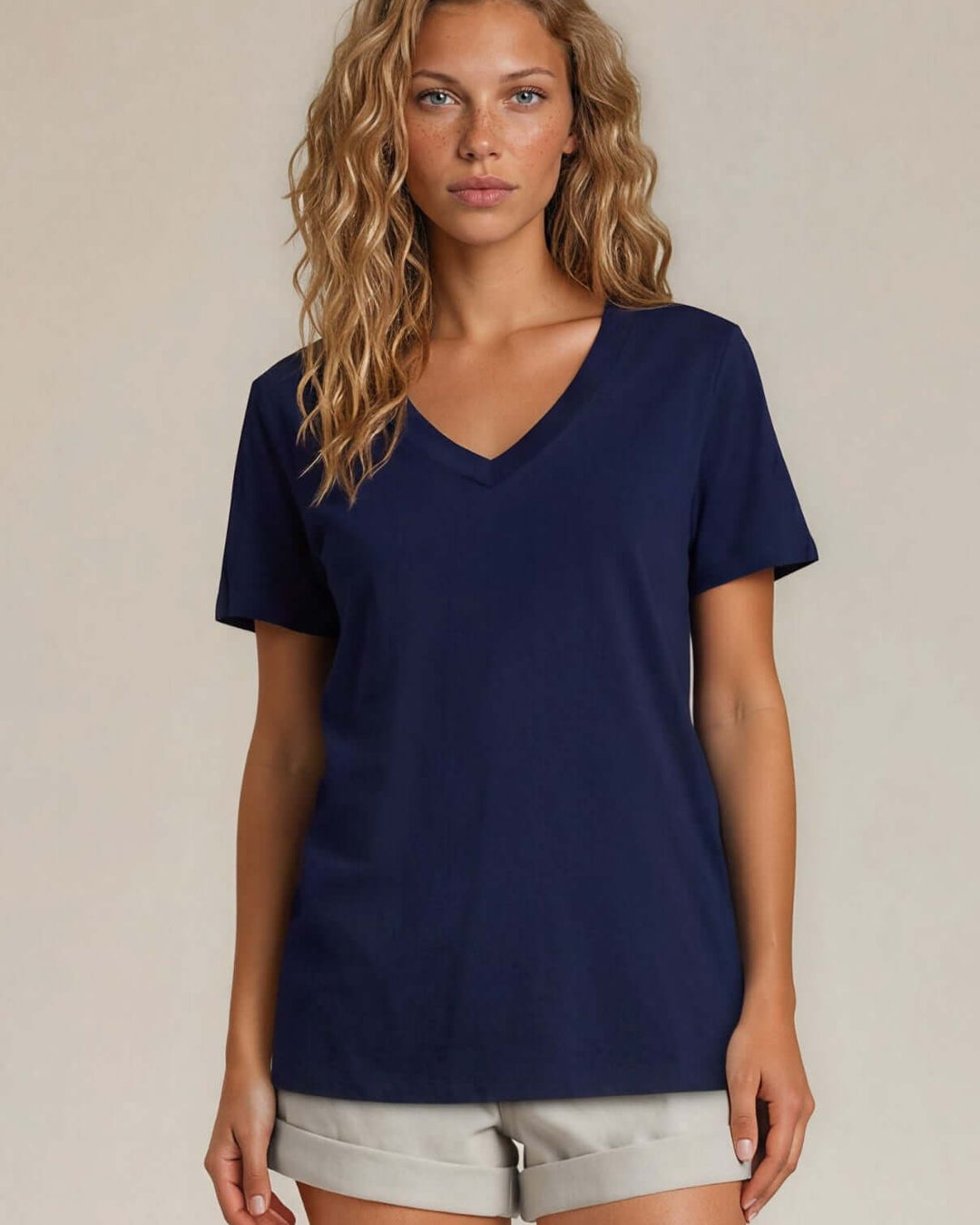The True American Women's T-Shirt: Super soft 100% combed ring-spun cotton V-neck tee in navy, made in the USA with USA-milled fabric. Flattering fit, effortless style.