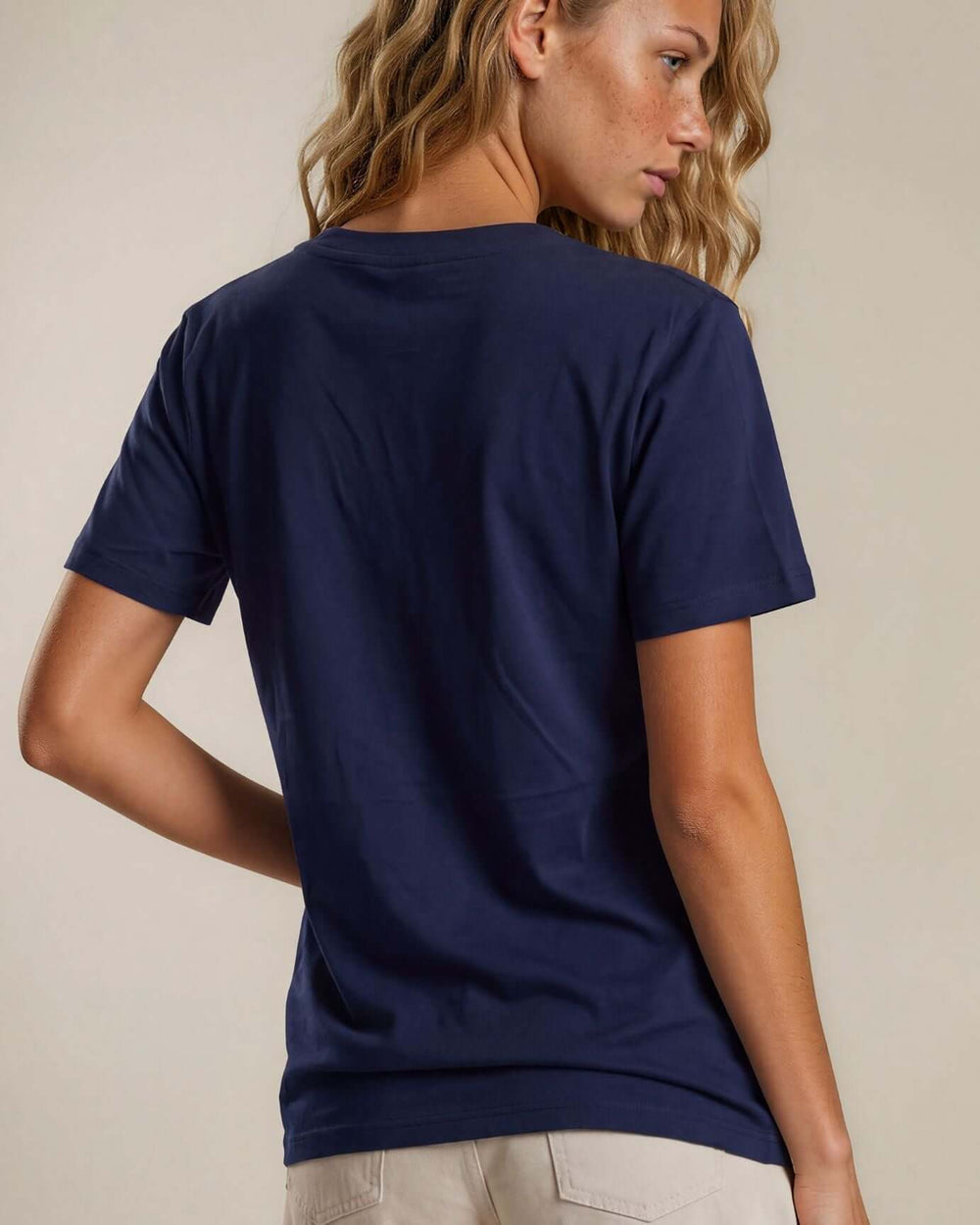The True American Women's T-Shirt: Super soft 100% combed ring-spun cotton V-neck tee in navy, made in the USA with USA-milled fabric. Flattering fit, effortless style.