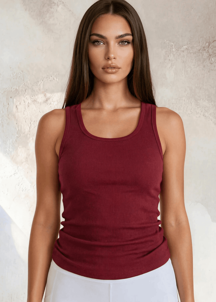 The Bra30 Tummy Tucker is an extra-long extra supportive racerback tank top that comfortably helps smooth out those unwanted lumps and bumps.  Dark Red Color , Made in USA