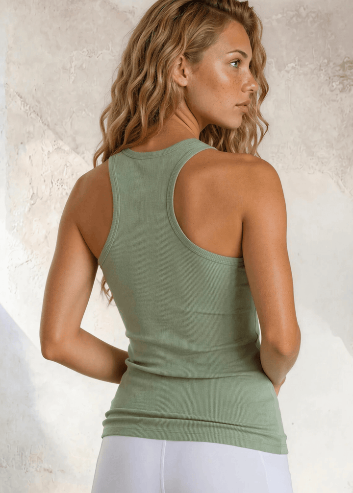 The Bra30 Tummy Tucker is an extra-long extra supportive racerback tank top that comfortably helps smooth out those unwanted lumps and bumps.  Sage Green Color , Made in USA