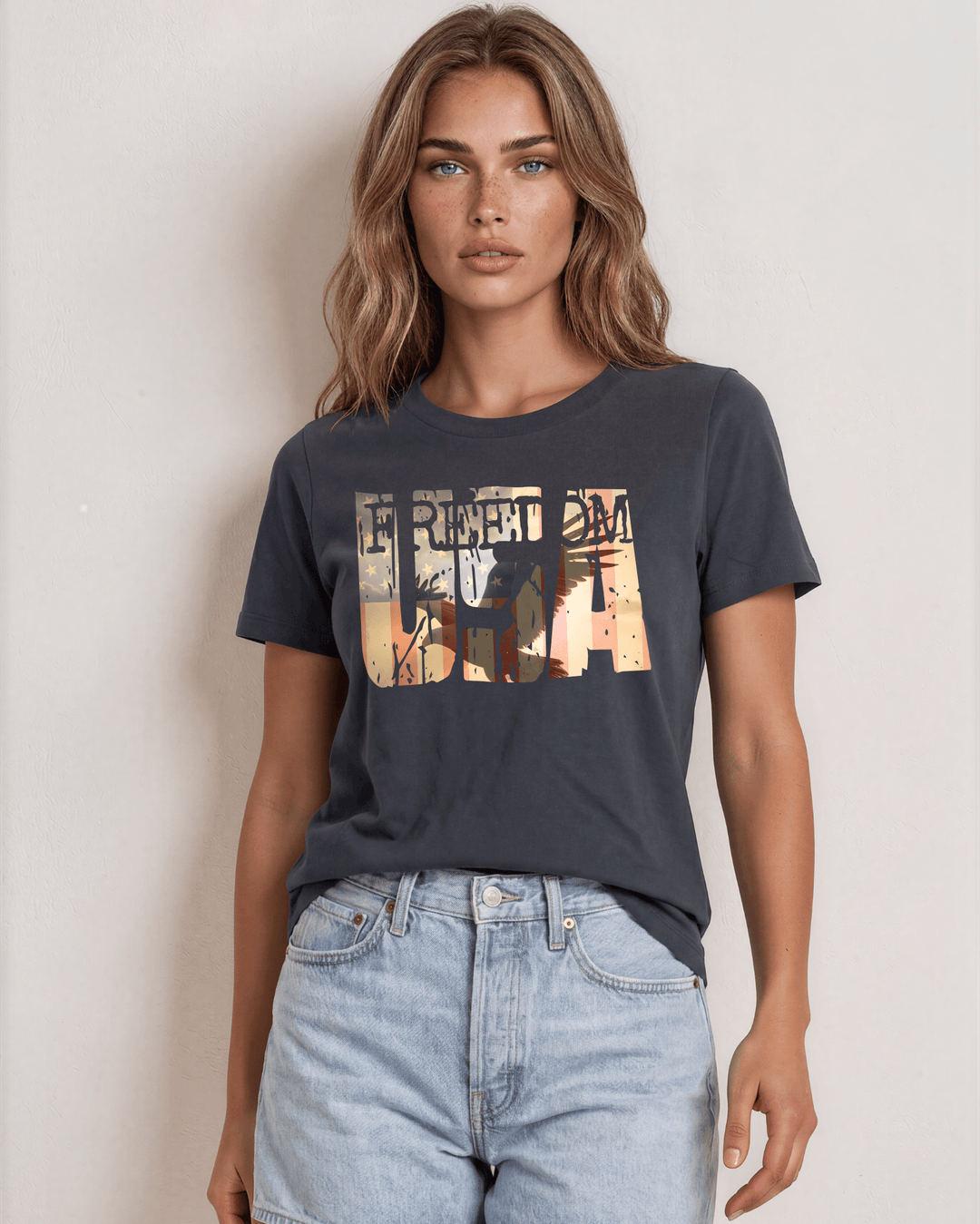 Bold FREEDOM USA soaring eagle sunset graphic tee on graphite. 100% combed ring-spun cotton, USA-milled fabric, made in USA. Perfect for 4th of July.