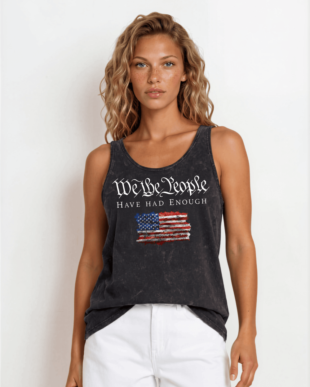 "We the People Have Had Enough" patriotic graphic tank — distressed American flag, mineral washed black, Made in USA with USA cotton. Relaxed fit, S–XL.