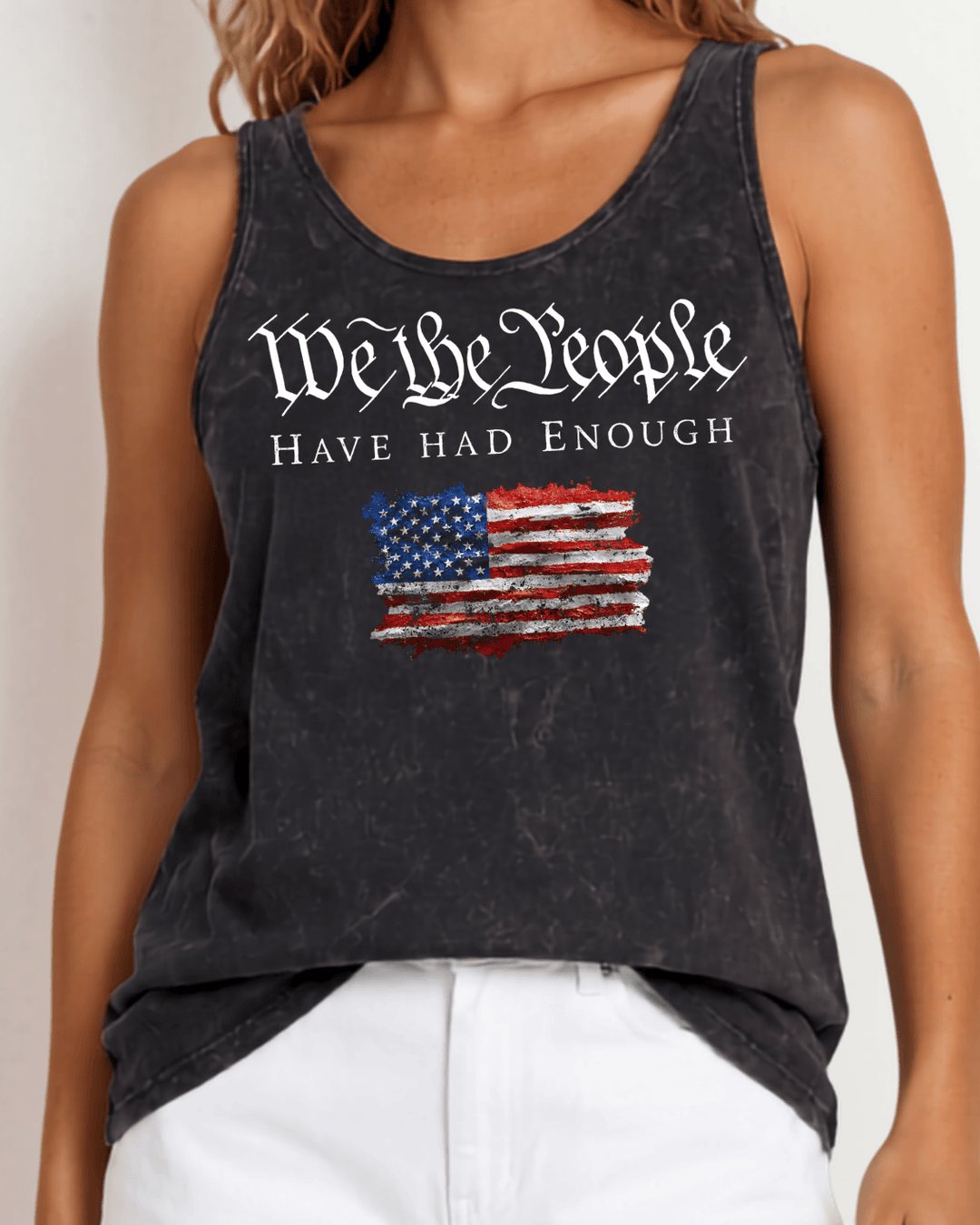 "We the People Have Had Enough" patriotic graphic tank — distressed American flag, mineral washed black, Made in USA with USA cotton. Relaxed fit, S–XL.