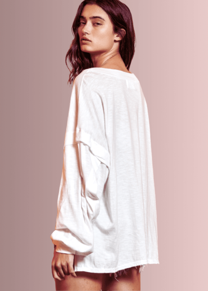USA Made Ladies Oversized White Cotton Long Sleeve Tee with Raw Edge Detail and Snap Down Front | Bucket List Clothing Style