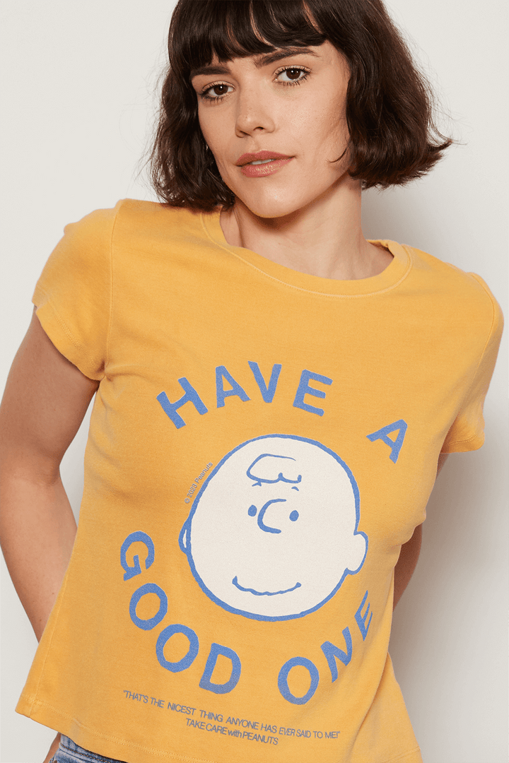 Add a little childhood nostalgia to your wardrobe. Our Peanuts "Have a Good One" Baby Tee is made in USA from 100% organic micro-rib cotton, making it ultra soft and body flattering. 