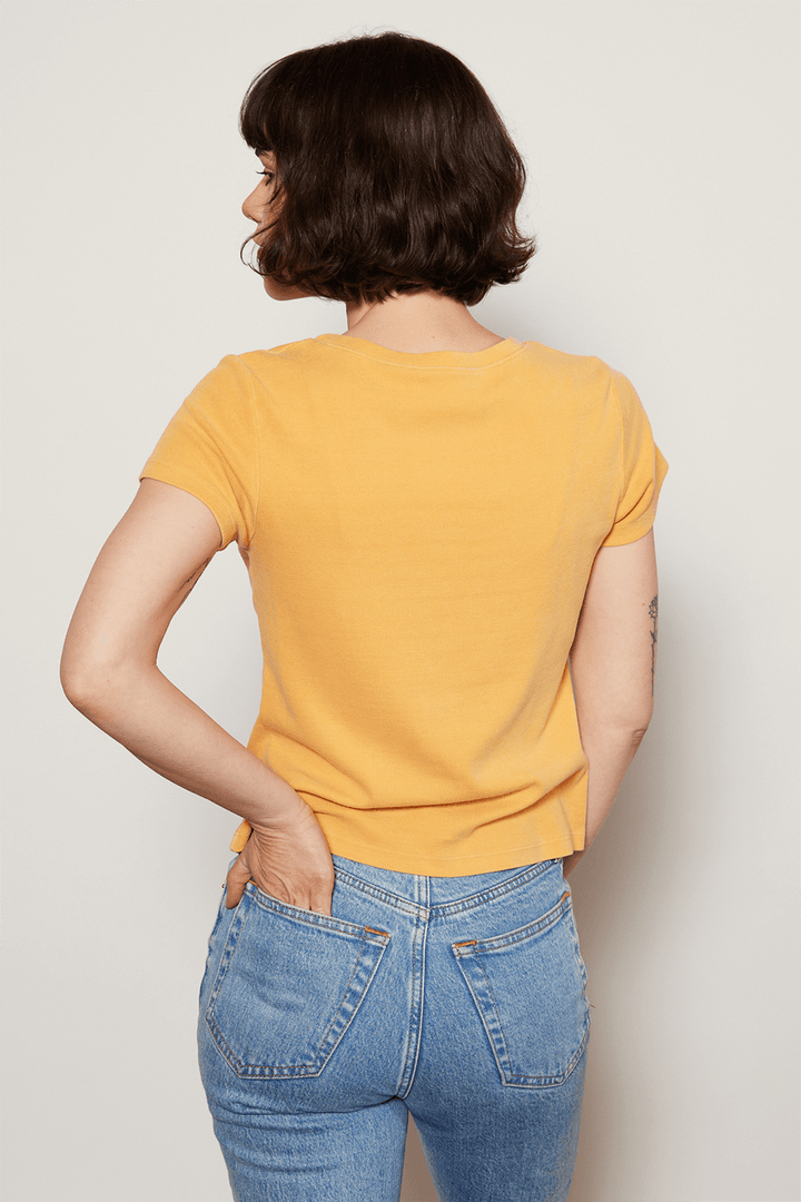 Add a little childhood nostalgia to your wardrobe. Our Peanuts "Have a Good One" Baby Tee is made in USA from 100% organic micro-rib cotton, making it ultra soft and body flattering. 