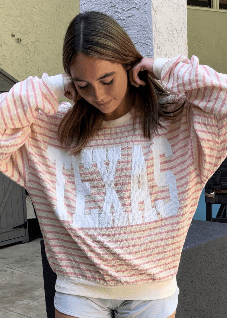 Made in USA Textured "TEXAS" Graphic Oversized Game Day Textured Sweatshirt with Crew Neck and Long Sleeves in Pink and Cream Stripes | Bucket List Style T1770