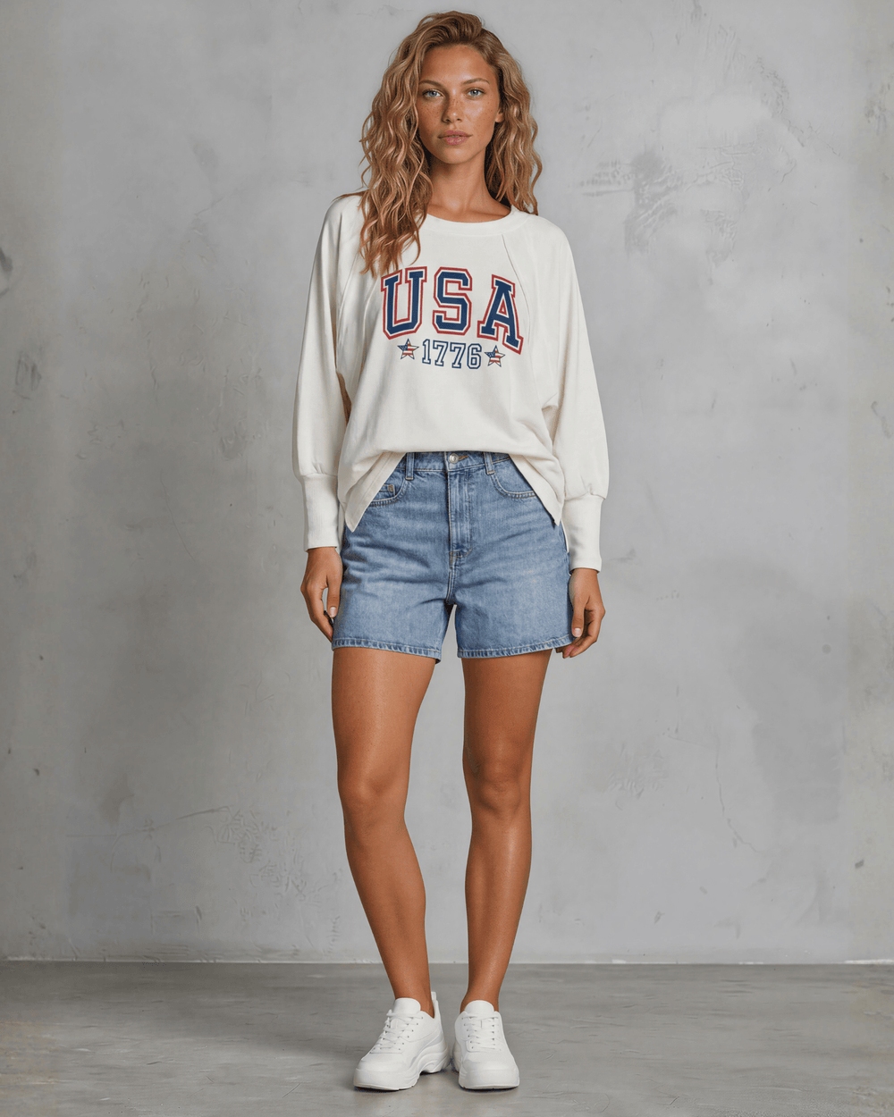 Bold USA 1776 varsity graphic on a soft oversized French terry sweatshirt. Made in USA, 88% cotton, dolman sleeves. Perfect for 4th of July & everyday wear.