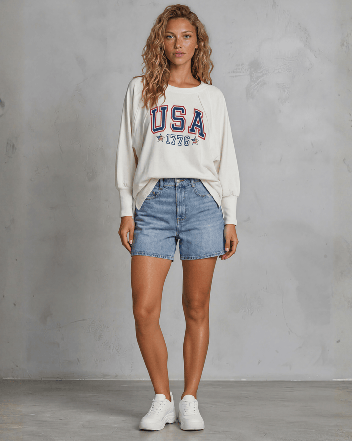 Bold USA 1776 varsity graphic on a soft oversized French terry sweatshirt. Made in USA, 88% cotton, dolman sleeves. Perfect for 4th of July &amp; everyday wear.